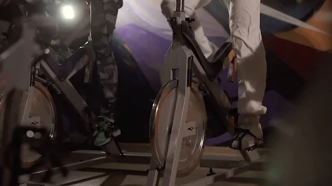 Close-up stationary bicycles in use Stock-Footage 74143733