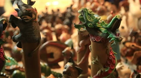 Close up of statuettes for burning incense sticks with smoke in a medieval Stockbeeldmateriaal 61289188