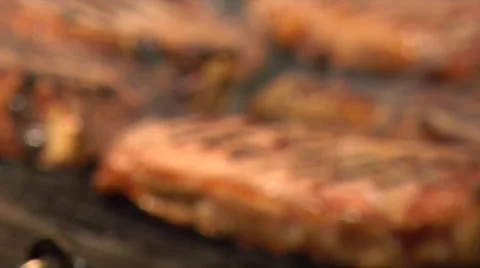 Close up of steaks cooking on a flame grill in restaurant. Stock Footage 47234990