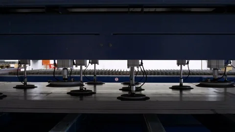 Close up of steal machine with suction hands in indoor factory, Portugal Stock Footage 129066634