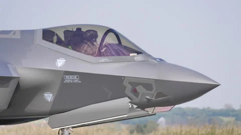 Close-up of a stealth fighter jet pilot with modern very expensive helmet Stock Footage 154962259