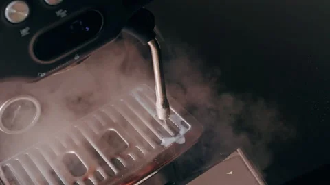 Close Up Of Steam Wand Cleaning Drip Tray With Residual Milk Foam And Rising Ste Stock Footage 331365833
