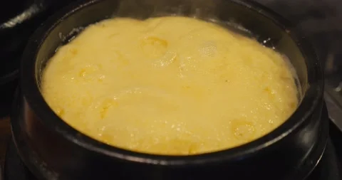 Close up of Steamed egg on hot stone. Stock-Footage 154013537