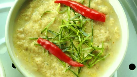 Close up steamed fish curry or Hor Mok in pot, Thai famous  food. Stock Footage 204766434