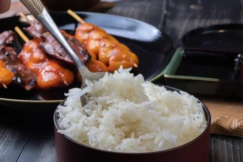 Close up of steamed rice with grilled chicken Foto stock