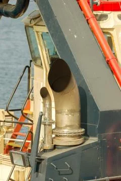 Close-up of the steamer pipe with traces of soot and soot on the surface. Sea Stock Photos