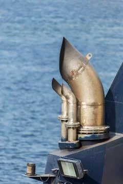 Close-up of the steamer pipe with traces of soot and soot on the surface. Sea Stock Photos