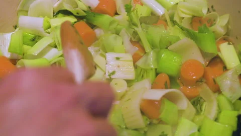 Close up of steaming fresh vegetables cooking on pan 库存影片 131541459