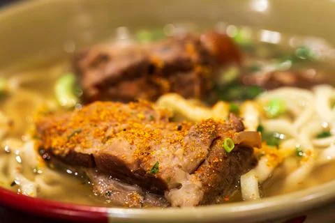 A close-up of steaming hot, authentic Chinese pork rib noodle soup. Stock Photos
