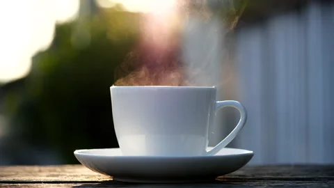 Close-up steaming hot coffee or tea cup, slow motion.Hot Coffee Drink Concept Stock Footage 143156340