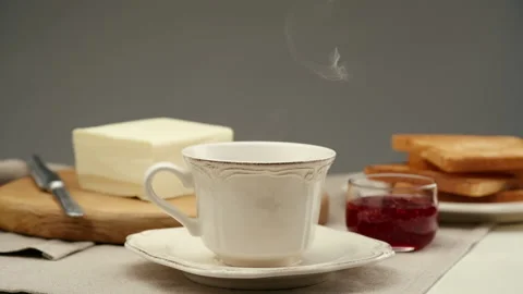 Close-up steaming hot coffee or tea cup Vídeo Stock 147449039