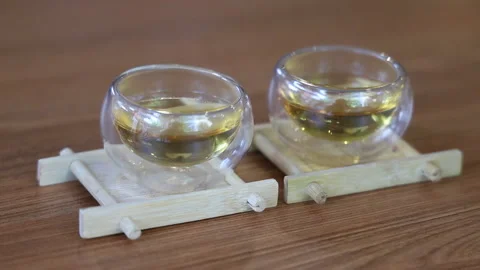Close-up steaming hot tea cups. Glass cups with double walls. Stock Footage 158997073