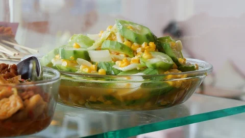 Close up of steaming hot vegetable salad in crystal bowl, Bali Stock Footage 140292850