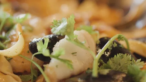 Close-Up of Steaming Seafood Chowder With Fresh Herbs Stock Footage 314476323