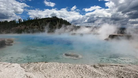 Close-up of a steaming turquoise geothermal pool with white mineral deposits -24 Stock-Footage 346102642