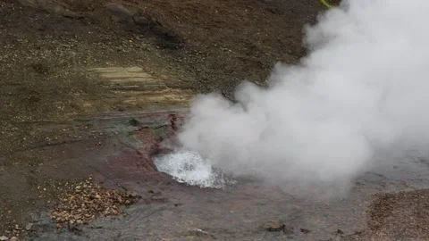 Close-up of steamy geyser, hot spring in Iceland with cloudy fog Stock Footage 247204622