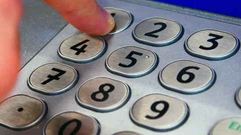 Close-up of a steel ATM keyboard panel and a male hand typing a pin code Stock Footage 170503380