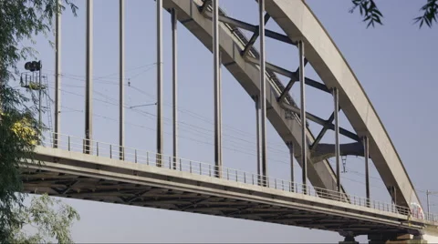 Close up of steel bridge with train passing Stock Footage 42727464
