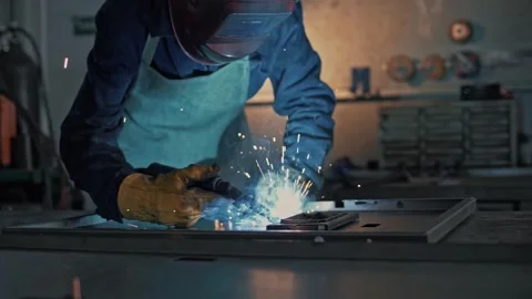 Close-up of a steel structure being welded in slow motion at the factory Stock Footage 265508069