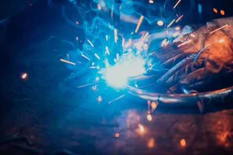 Close up of the steel welding process. Work in the heavy steel industry Stock Photos