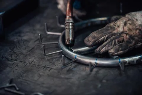 Close up of the steel welding process. Work in the Stock Photos