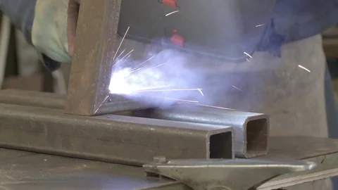 Close-up of a steel worker welding Stock Footage 74760456