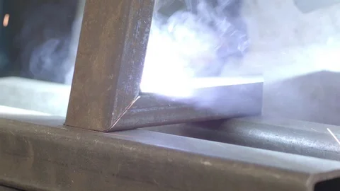Close-up of a steel worker welding Stock Footage 74760565