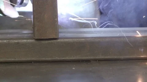 Close-up of a steel worker welding Stock Footage 74761808