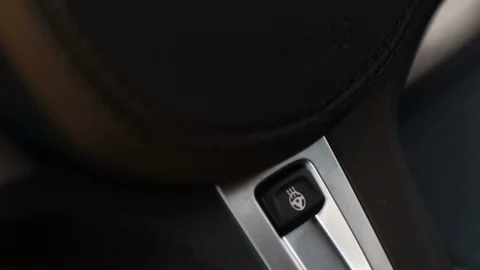 Close-up, steering wheel heating button. Stock Footage 121529606