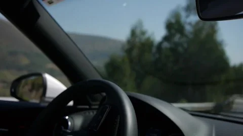 Close-up of the steering wheel in a moving car. Stock Footage 80248731