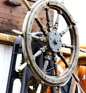 Close up of a steering wheel of the ship Stock Photos