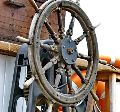 Close up of a steering wheel of the ship Stock Photos