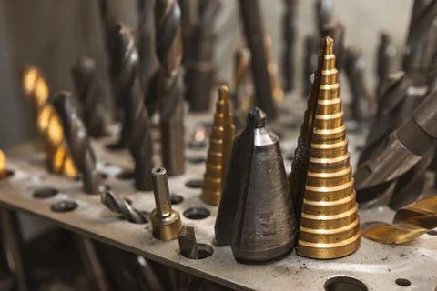 Close up step Drill Bits and Cobalt Drill Bit Set. Home improvement or Stock Photos
