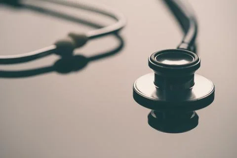 Close up of stethoscope with reflection. Stock Photos