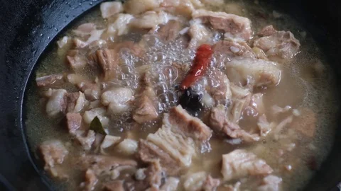 Close up of stewing beef in Chinese cooking style, slow motion 120FPS Stock Footage 114644043