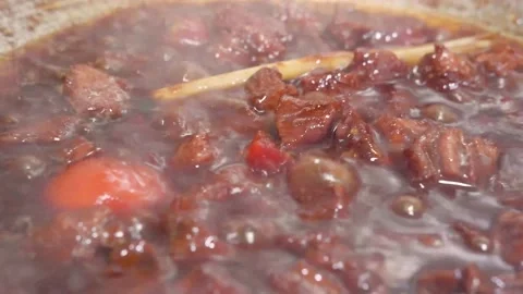 Close up stewing beef in the pan. 스톡 동영상 157591540