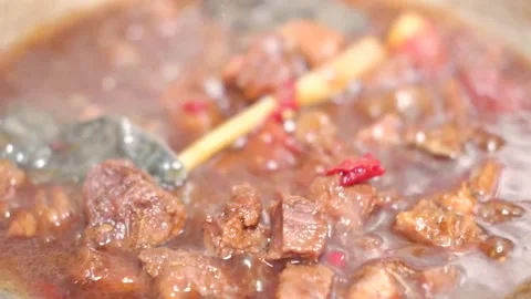 Close up stewing beef in the pan. selective focus. Stock Footage 157591300