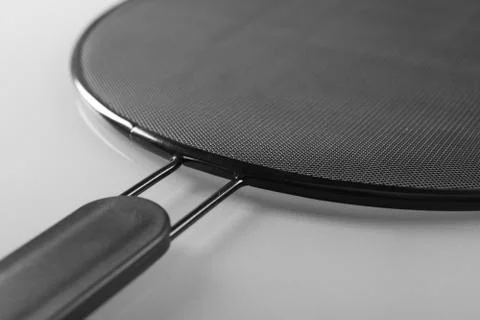 Close up of on-stick splatter screen Stock Photos