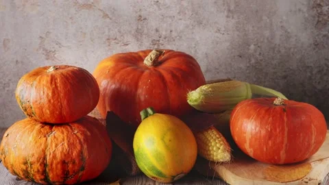 Close up of still life with many pumpkins on rustic background Stock Footage 138380556