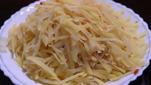 Close Up of Stir Fried Shredded Potatoes Stock Footage 346488776