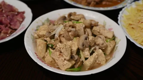 Close Up of Stir Fried Tofu with White Button Mushrooms Stock Footage 346488731