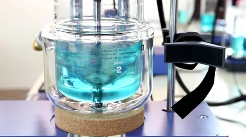 Close up of stirring and mixing process in laboratory Stock Footage 54978184