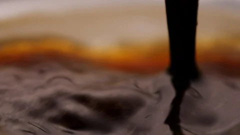 Close-up of stirring coffee with spoon in slow motion Stock-Footage 125963377