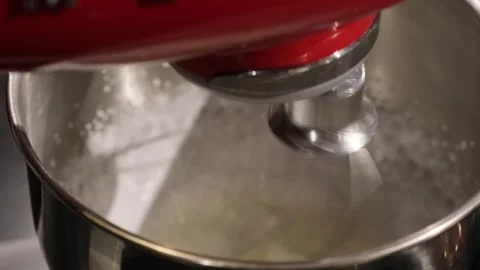 Close-up of stirring ingredients in a food processor. Stock Footage 317483450