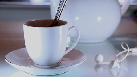 Close Up Of Stirring Sugar Of a Coffee Cup Video stock 170154588
