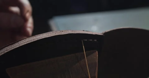 Close-up of stitching leather goods with two threads Stock-Footage 144366884