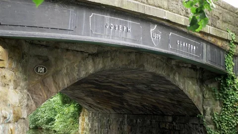 A close up of a stone bridge built in 1876, over a canal in Lancaster, England Video stock 117427413