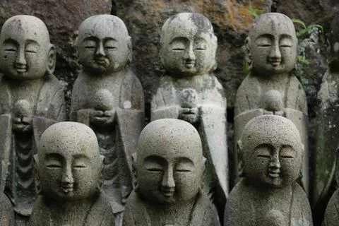 Close-up of Stone Buddha Statues in Rows Stock Photos