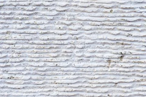 Close-up of stone surface with traces of processing. Parallel lines on the stone Stock Photos