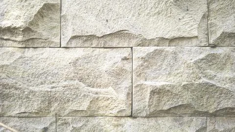 Close up Stone tile wall texture pattern background Stock Photos